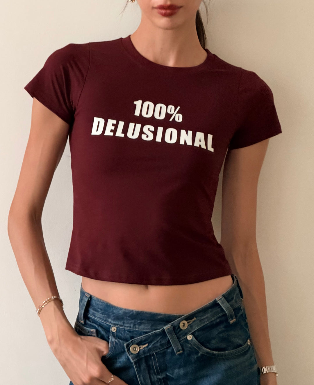 100% DELUSIONAL BABY TEE