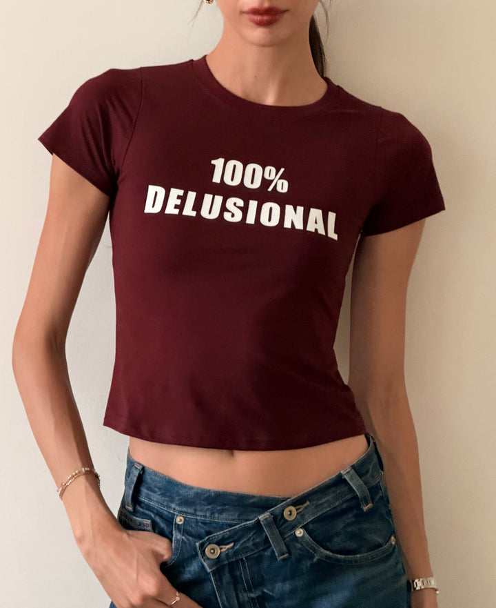 100% DELUSIONAL BABY TEE
